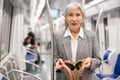 Senior woman was robbed in subway train Royalty Free Stock Photo