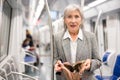 Senior woman was robbed in subway train Royalty Free Stock Photo