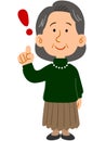 A senior woman wearing a green sweater with her index finger raised, whole body