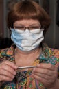 Senior woman wearing mask for protect pm2.5 and Covid-19