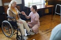 Senior Woman in Wheelchair a Nursing Home Royalty Free Stock Photo