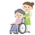 Senior woman in wheelchair and nursing staff