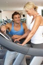 Senior Woman Working With Personal Trainer Royalty Free Stock Photo