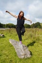 Balancing senior lady on fitness track Royalty Free Stock Photo