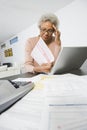 Senior Woman Worrying About Home Finances