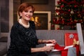 Senior woman wrapping christmas presents Royalty Free Stock Photo