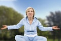 Senior woman yoga positio Royalty Free Stock Photo