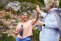 Senior women, fitness or people high five for goal or success together for outdoor exercise in retirement. Winning