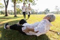 Senior woman is holding her hip,severe pain in her muscle,broken bone,injury to the waist,old elderly lying on the ground,she fell Royalty Free Stock Photo