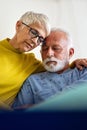 Senior woman with seriously ill husband in hospital. Healthcare support anxiety love concept Royalty Free Stock Photo