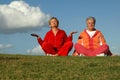 Senior women yoga outdoors Royalty Free Stock Photo