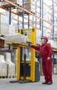 Senior worker with bar code reader in warehouse Royalty Free Stock Photo
