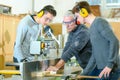 senior and young men - woodwork apprenticeship Royalty Free Stock Photo