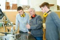 senior and young men - woodwork apprenticeship Royalty Free Stock Photo