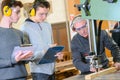 senior and young men - woodwork apprenticeship Royalty Free Stock Photo