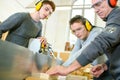 senior and young men - woodwork apprenticeship Royalty Free Stock Photo