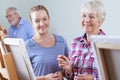 Seniors Attending Painting Class With Teacher Royalty Free Stock Photo