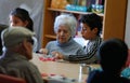 Seniors and childs during therapeutical activities on a nursing home in Mallorca Royalty Free Stock Photo