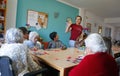 Seniors and childs during therapeutical activities on a nursing home