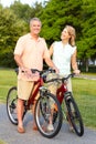 Seniors couple biking