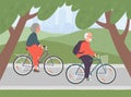 Seniors couple cycle on bicycle together in the city park