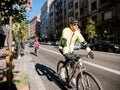 Seniors cycling in central Barcelona morning fitness