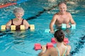 Seniors doing aqua aerobics Royalty Free Stock Photo