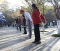 Seniors exercising in a park