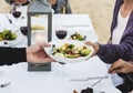 Seniors having a dinner party at the beach Royalty Free Stock Photo