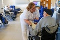 Seniors and nurse during their daylife on a nursing home in Mallorca Royalty Free Stock Photo