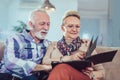 Seniors looking at their photo album Royalty Free Stock Photo