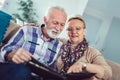 Seniors looking at their photo album Royalty Free Stock Photo