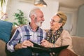 Seniors looking at their photo album Royalty Free Stock Photo