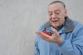 Seniors man with strawberries Royalty Free Stock Photo