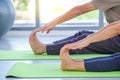 Seniors performing yoga in studio Royalty Free Stock Photo