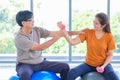 Seniors performing yoga in a studio Royalty Free Stock Photo