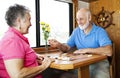 Seniors Play Backgammon Royalty Free Stock Photo