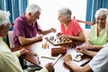 Seniors playing games Royalty Free Stock Photo