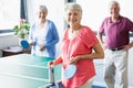 Seniors playing ping-pong Royalty Free Stock Photo