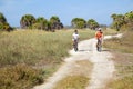 Seniors Riding Bikes at Beach Royalty Free Stock Photo