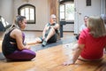 Seniors taking rest with dance teacher Royalty Free Stock Photo