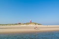 Seniors walking on beach of Texel island, Netherlands Royalty Free Stock Photo