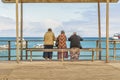 Seniors Women Watching the Ocean, Galapagos, Ecuador