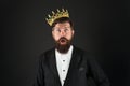 Sense of self importance. Responsibility being king. All what they say is true. Handsome bearded guy king. King crown Royalty Free Stock Photo