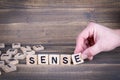 Sense. Wooden letters on the office desk