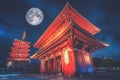 Sensoji is an ancient Buddhist temple with full moon at night in Asakusa, Tokyo, Japan. Elements of this image furnished by NASA Royalty Free Stock Photo