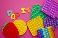 Sensory fidget toy `Pop-it`.