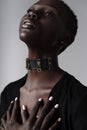 Sensual african american woman wearing leather choker