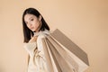 sensual asian woman in ivory blazer