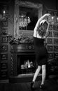 Sensual attrctive woman in luxury interior in black dress Royalty Free Stock Photo